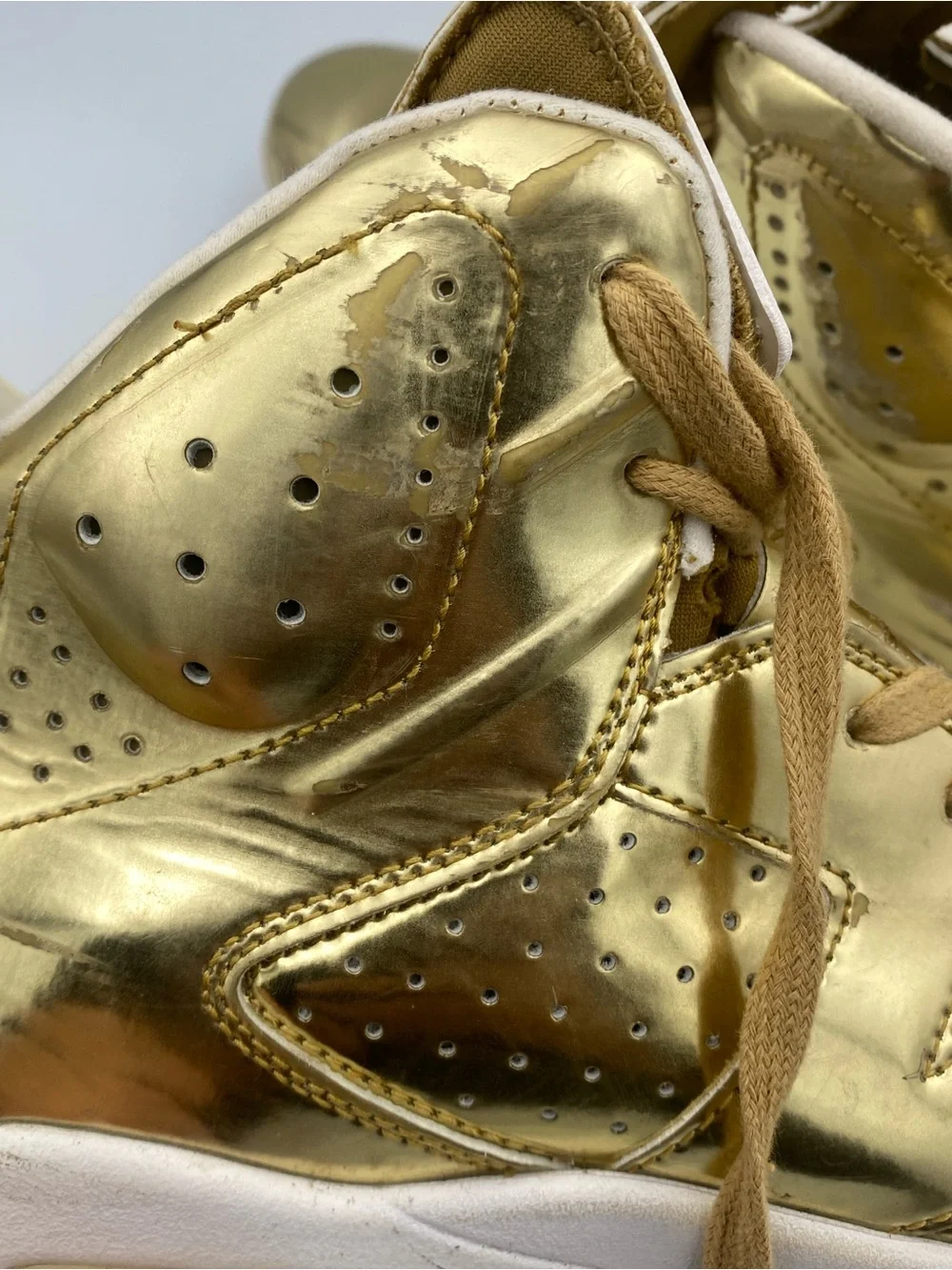 Jordan Metallic Gold High Top Sneakers with White Interior
